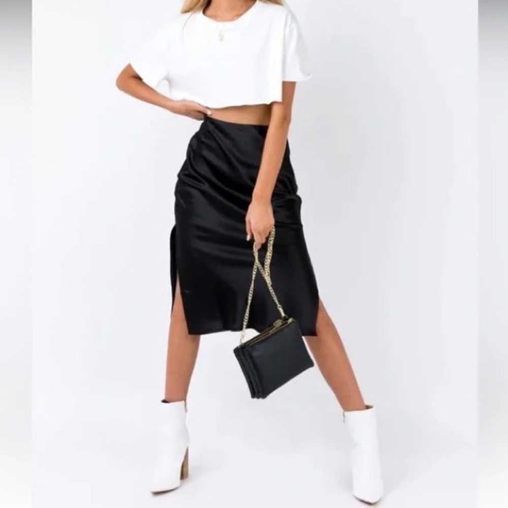 NWOT! Never worn. Beautiful Princess Polly midi skirt with side slits.